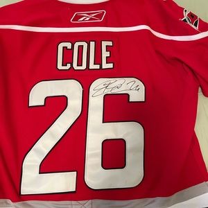 Signed Erik Cole #26 Licensed Authentic Sweater w/tie-down strap.